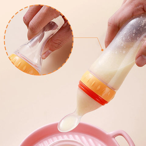 Baby Squeezing Feeding Spoon Bottle