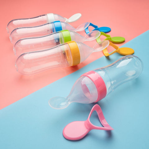 Baby Squeezing Feeding Spoon Bottle